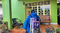 Cegah Wabah Corona Legislator Nasdem Semprot Tempat Ibadah dan Rumah Warga