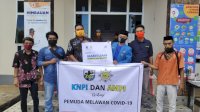 Bersama AMPI, DPD KNPI Soppeng Berbagi Sembako dan Masker