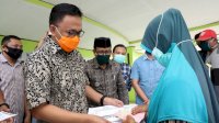 Desa Bajiminasa Salurkan BLT, Bupati: Penanda Kehadiran Pemerintah