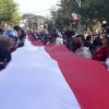 Bentangkan Bendera Sepanjang 201 Meter, Pecinta Automotif Harap Punya Sirkuit di Makassar