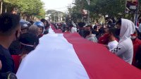 Bentangkan Bendera Sepanjang 201 Meter, Pecinta Automotif Harap Punya Sirkuit di Makassar