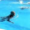 Laksana di Medan Perang Marinir Di Makassar Berenang Gunakan Helem Tempur