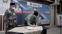 Bupati Luwu dan Satgas PEN Bagikan Makanan Kepada Masyarakat Berpenghasilan Rendah