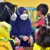 Begini Kedekatan Naoemi Octarina dengan Anak-anak