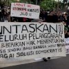 Hari HAM Sedunia: Spanduk Bertulis “Cabut Otsus Jilid II dan HMNS Bagi Bangsa West Papua” Dibentangkan di Makassar