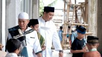 Jum’at Berkah, MHG Bagikan Kue dan Nasi Dos ke Masyarakat