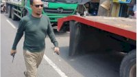 Kadishub Makassar Tegur Supir Truk Yang Parkir di Badan Jalan