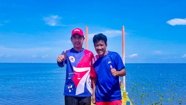 Ketua DPRD Makassar Rudianto Lallo (bertopi merah).