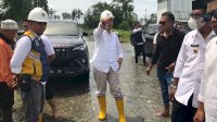 Wabup Lutra Tinjau Titik Banjir di Malangke