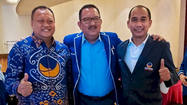 Ni'matullah (tengah), Rudianto Lallo (kanan) mengenakan jas berlambang bendera NasDem