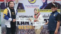 Peraih Hadiah Jalan Sehat Nasdem Terima BPKB dan STNK Mobil