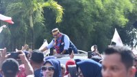 Dipimpin Rusdi Masse, Kompaknya Kader NasDem Se-Sulsel Sambut Anies Baswedan Saat Tiba di Makassar