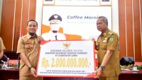 Bupati Luwu Terima Bantuan Keuangan Tanggap Darurat Rp.2 M Dari Gubernur Sulsel