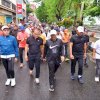 Pj Gubernur Jalan Sehat dan Bakti Sosial di Pantai Losari untuk Meredakan Ketegangan Politik Jelang Pemilu 2024