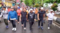Pj Gubernur Jalan Sehat dan Bakti Sosial di Pantai Losari untuk Meredakan Ketegangan Politik Jelang Pemilu 2024