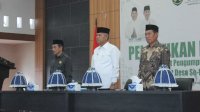 Bupati Luwu Basmin Mattayang Memperingatkan Pentingnya Pembayaran Zakat saat Melantik UPZ Tingkat Desa