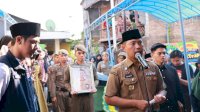 Pjs Wali Kota Arwin Azis Pimpin Upacara Pemakaman Kepala UPTD PPA Makassar Muslimin Hasbullah