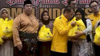 Rahman Pina Dampingi Ketum AMPG Bagi 10 Ribu Paket Lebaran di Jakarta