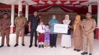Bupati Sidrap Serahkan Santunan BPJamsostek, Ajak Peserta Apel Doakan Almarhum Kades Bulucenrana