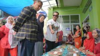 Munafri &amp; Melinda Aksa Meriahkan Festival Bakar Ikan Ujung Tanah