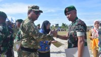 Hari Bela Negara, Bupati Luwu Utara Beri Penghargaan Pelatih Bimbel Jasmani Pencetak Prajurit TNI