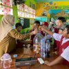 Dari Sekolah untuk Kota: Gerakan 10.000 Liter Eco Enzym Warnai Hari Guru Nasional di Makassar