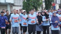 Lautan Manusia Padati Anjungan Losari, Munafri Resmi Lepas Makassar Half Marathon 2026