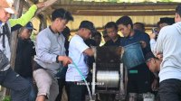 Tinjau Proses Hulling Kopi Tana Toro, Bupati Syaharuddin Apresiasi Upaya Petani Jaga Mutu